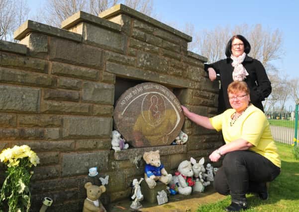 Pictured with the SANDS bereaved mums memorial stone at Carleton Crematorium are,bereaved mum Karen Nelson, front, and Chairman of Blackpool and Preston SANDS.