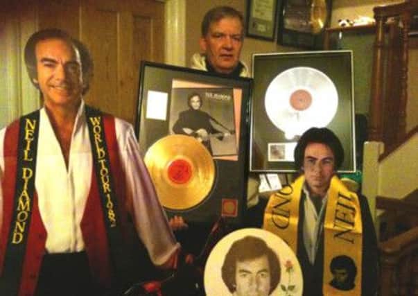 Neil Diamond megafan Ian Graham prepares for his Blackpool date, with some of his memorabilia