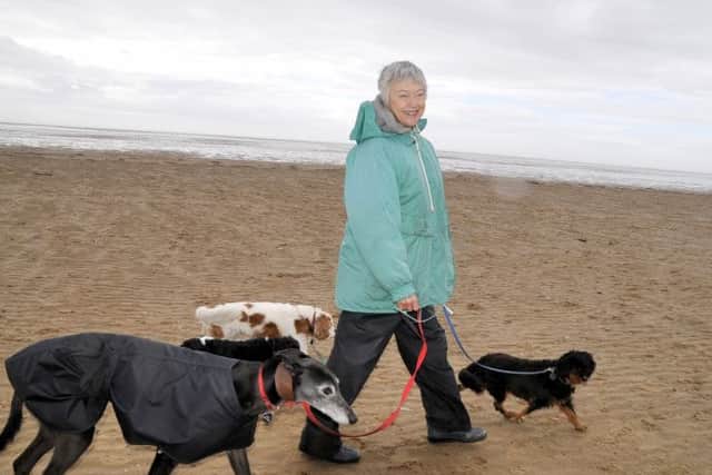 Sandra Bigley joins in the beach dog walk at St. Annes
