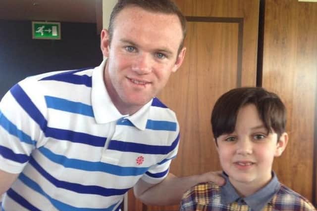 Wayne Rooney meets Louis Crowson at the Manchester United 'Dream Day'
