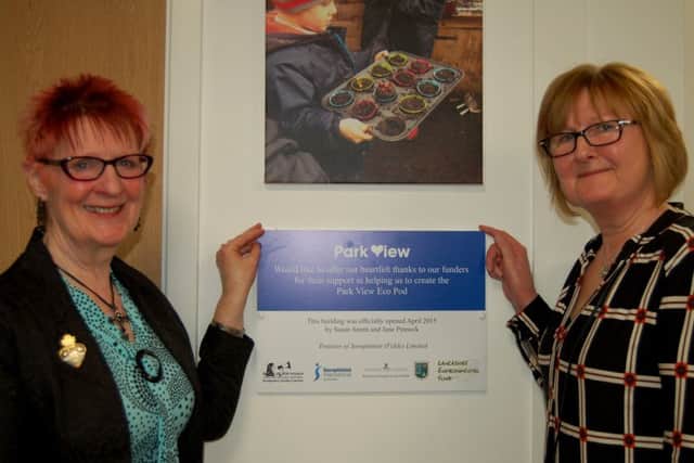 Susan Smith and Jane Pinnock unveiling the plaque at the new Eco pod