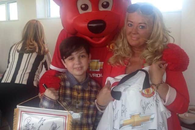 Louis and his mum Suzanne at Manchester Uniteds training complex
