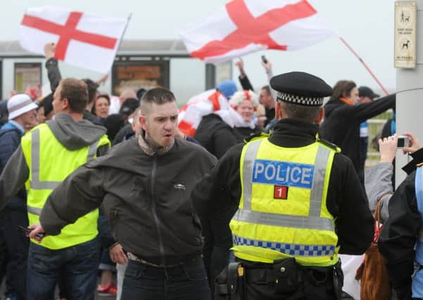 March for England in Blackpool.  Demonstrators are stopped by the police.