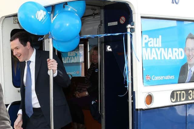 Chancellor George Osborne gets off a bus for a visit to New Yorker Sundaes Ice Cream Parlour in Cleveleys while on the General Election campaign trail. Photo: Peter Byrne/PA Wire