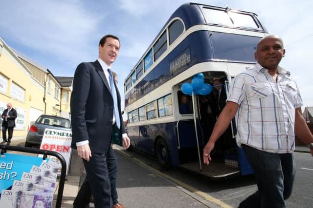 Chancellor George Osborne during a visit to New Yorker Sundaes Ice Cream Parlour in Cleveleys while on the General Election campaign trail. Photo: Peter Byrne/PA Wire