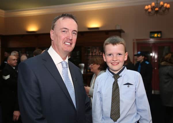 Youngster Cormac OKane, eight, with Lancashires Police and Crime Commissioner Clive Grunshaw