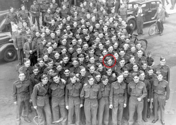 Harry Motteram, circled, with his comrades as they prepare to leave for Singapore