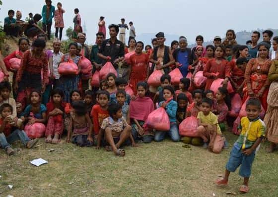 Pictured are just some of the thousands of Nepalese children being helped