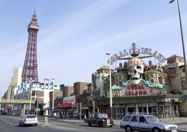 General view of Blackpool. 
View along promenade  showing Blackpool Tower and Coral Island