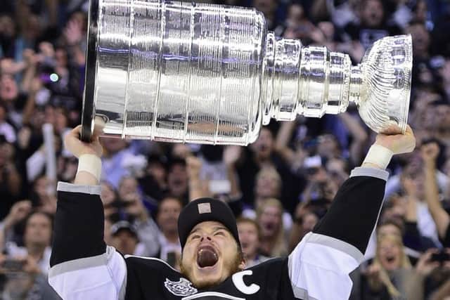 A Los Angeles Kings player with the Stanley Cup