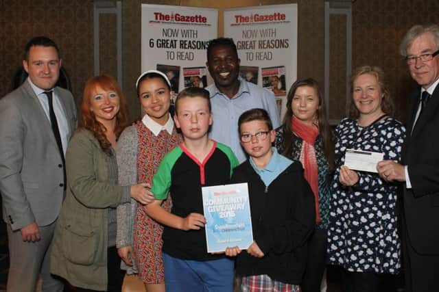 Community Giveaway 2015 by Swallowdale Children's Turst in association with The Blackpool Gazette at The Imperial Hotel.
Pictured is Gazette Deputy Editor Andy Sykes and Chairman of Swallowdale CHildren's Trust with Community Giveaway Winners Streetwise Youth Club.
4th June 2015