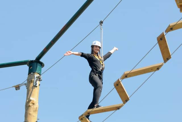 Katie Upton tries out the new high ropes course Outdoor Revolution at Stanley Park