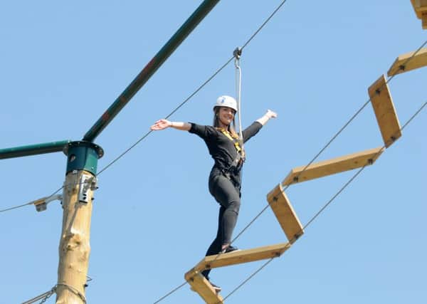 Katie Upton tries out the new high ropes course Outdoor Revolution at Stanley Park