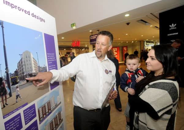Members of the public inspecting the plans on display at the Houndshill Centre