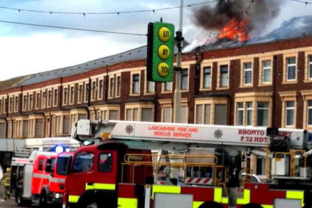 Firefighters tackle the blaze at the Warwick Hotel