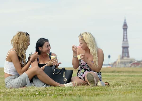 Pictured enjoying an ice cream on the prom are Beth Barnes, 17, Lauren Hirst, 21 and Loren Cawthorne, aged 20