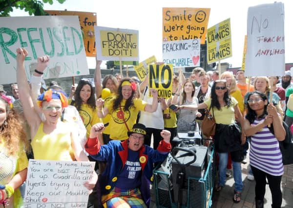 Anti-fracking protesters celebrate outside Lancashire County Hall after Cuadrilla's fracking application is refused.