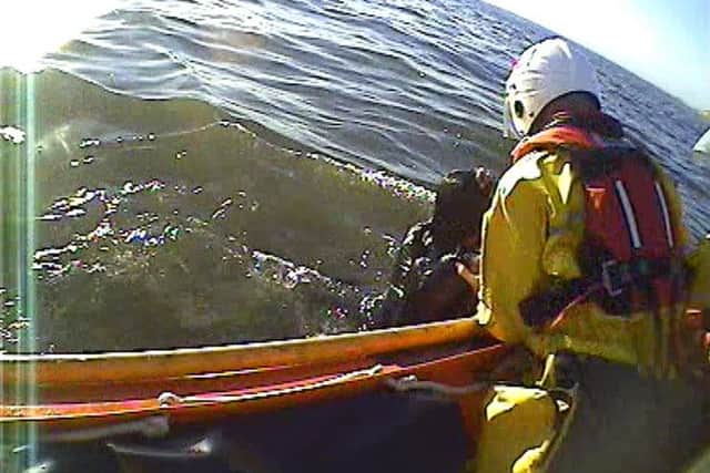 Blackpools RNLI crew pluck a woman from the sea in North Shore