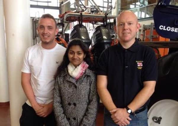 RNLI volunteer crew members Jonathan Horrocks and Alan Gilchrist meet Uzma Khan, the woman they rescued from the sea off Blackpool