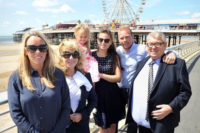 The Sedgwick family, who own Blackpool's North Pier, have just announced a deal that makes them owners of Central and South Pier as well. Pictured outside Central Pier are Peter Sedgwick (right), Peter Sedgwick Jnr, Sue, Renee, Sibby and Sibana