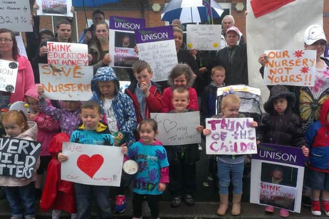 A protest outside Grange Park Sure Start Centre against the closure of the nursery