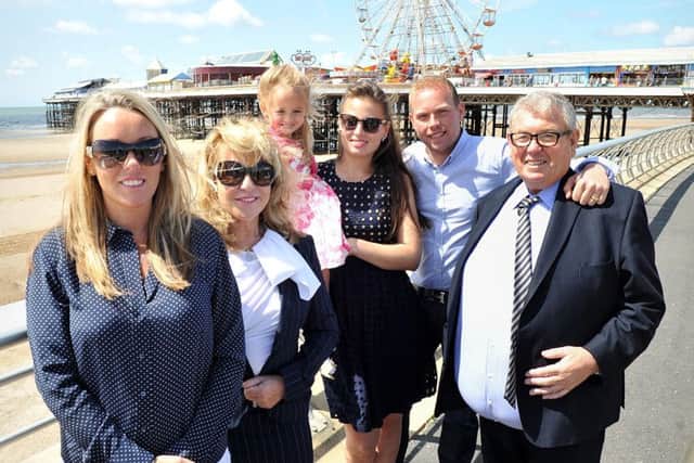 The Sedgwick family, who own Blackpools North Pier, announcing a deal that makes them owners of Central and South Pier as well. Pictured outside Central Pier are Peter Sedgwick (right), Peter Sedgwick Jnr, Sue, Renee, Sibby and Sibana