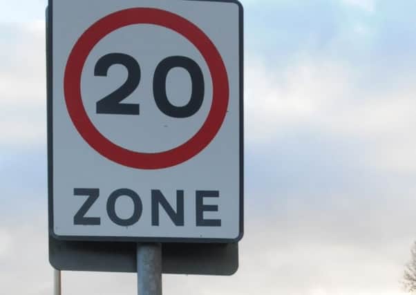 20mph zone sign