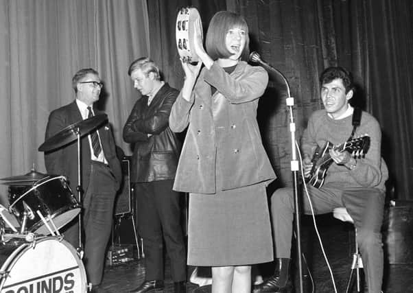Cilla Black in rehearsal with the Sounds Incorporated group before their show at the ABC Ritz in September 1964