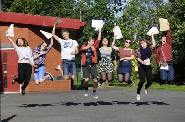 A Level results at Baines. Students celebrate.