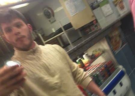 Police want to speak to this man after an assault at a Fleetwood takeaway.