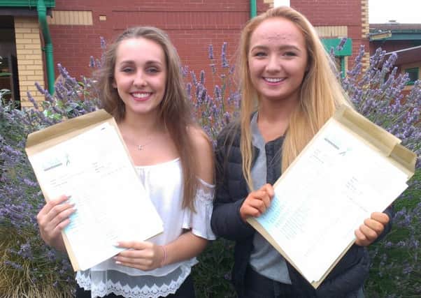 Lucinda Heavyside (left) and Jemima Bolton, both 16 and from St Annes, wth  their GCSE results at Lytham St Annes Technology and Performing Arts College