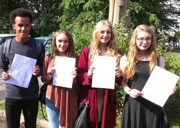 Patrick Orosun from Ansdell, Roisin Heron from St Annes, Natasha Godsiff from St Annes and Lizzie Daly from Kirkham, all 16, with their GCSE results at St Bede's RC High School, Lytham