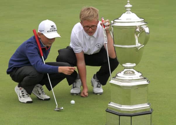 Youngsters Callum and Grady Rogerson - looking foward to watching the Walker Cup