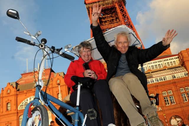 BLACKPOOL - BEG
Margaret Dickinson and Thomas Sedgwick, right, on their homemade Rickshaw made for the event.
Families and friends get on their bikes for the annual Ride the Lights event, cyclists could ride up and down the Promenade, a bike-only-zone for one night only, from 6pm until 10pm.