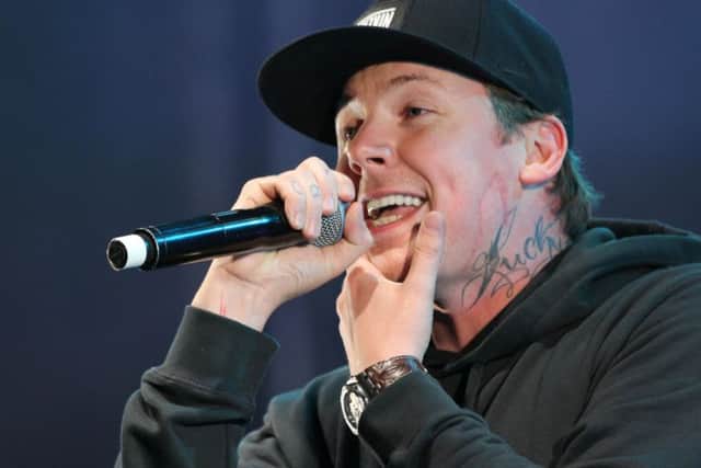 Pictured is Professor Green performing on stage.