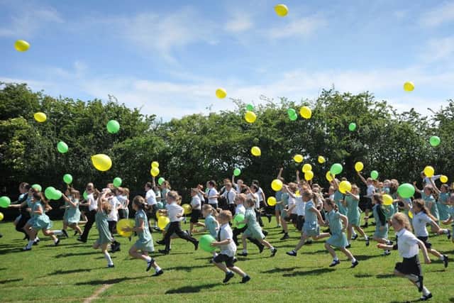 Pupils at Strike Lane Primary School in Freckleton marked the school's 50th birthday with a mass balloon launch on the playing field.
