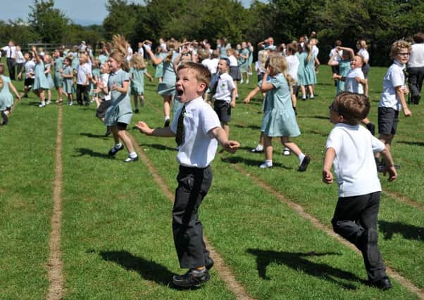Pupils at Strike Lane Primary School in Freckleton marked the school's 50th birthday with a mass balloon launch on the playing field.
Watching the balloons soar.