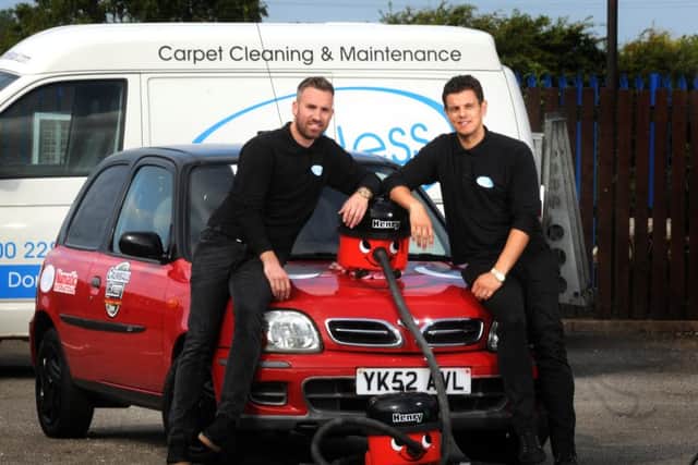 From left, Chris Days and Tom Swire from SpotlessUK with their Henry the Hoover decorated car, which they are entering into the Crumball Rally