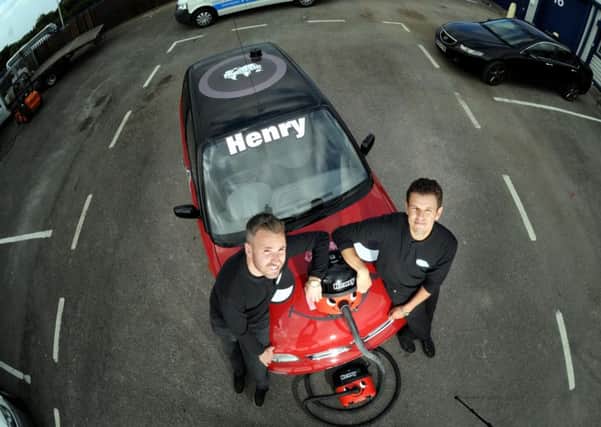 From left to right, Chris Days and Tom Swire from SpotlessUK with their Henry the Hoover decorated car, which they are entering into the Crumball Rally