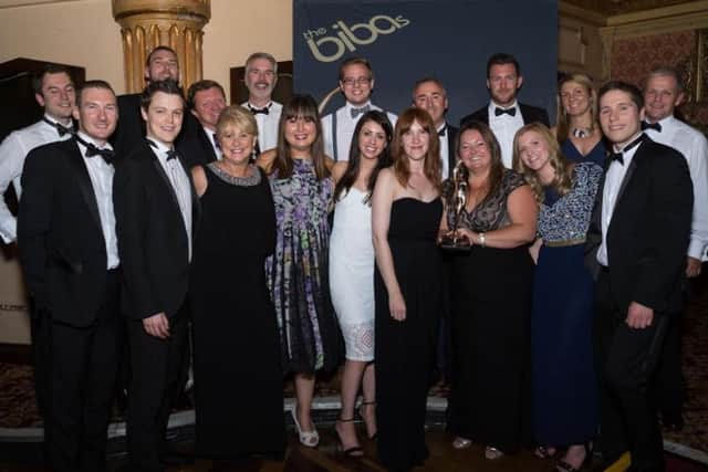 Danbro staff celebrate winning their BIBA award