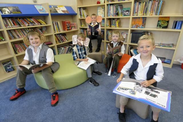 Children and teachers from Royles Brook Primary School dress up as Roald Dahl characters and mark the opening of their new library.  Neil Sandham, Alex Johnson, Jack Brundish, Jack Jordan and Marcus Butler-Terry.