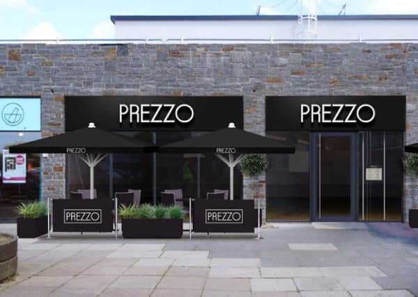 An artists impression of how the new Prezzo restaurant will look when it opens and Coun David Henderson (inset)
