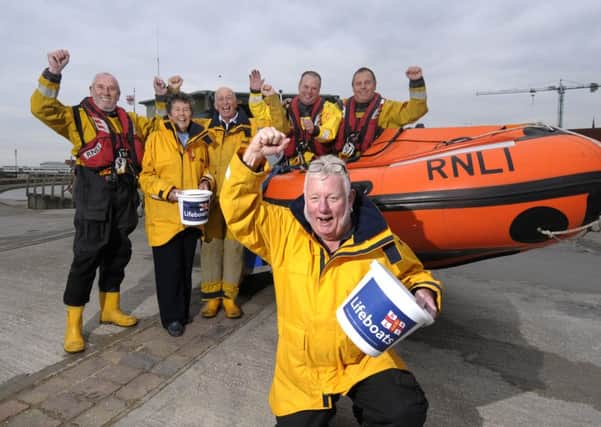 RNLI Lytham St Annes has been given a large sum of money from an anonymous donor which has enabled them to purchase a new lifeboat.  Pete Whalley celebrates (front) with Digby Moulden, Sheila Jose, Dave Procter, Andy Jackson and Andy Cunningham.
