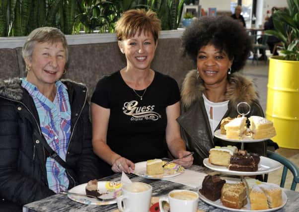 Roberta Hamilton and Sonja Ferguson with Great British Bake Off contestant Dorret Conway during her visit to Booths supermarket in St Anne's where she spoke with customers and answered baking questions