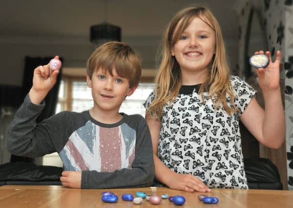 Megan, nine, and Daniel Coward, seven, of Flakefleet Avenue in Fleetwood, have found a series of intricately-painted stones on the ports beach