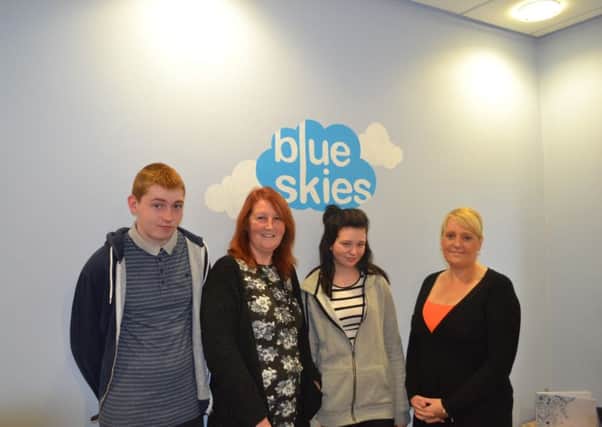 James, left, Christine and Vanessa Procter visit Blue Skies  Hospitals Fund after raising £1,146 for the Breast Care Centre at   Blackpool Victoria Hospital. Also pictured is Nicci Hayes, Fundraising   Officer for Blue Skies
