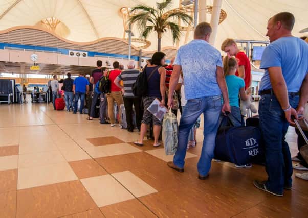 Holidaymakers queuing at the airport in Sharm el-Sheikh