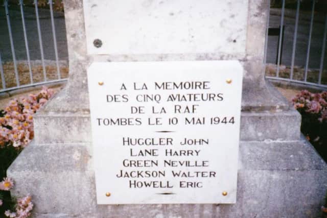 close-up of the plaque on the village War Memorial