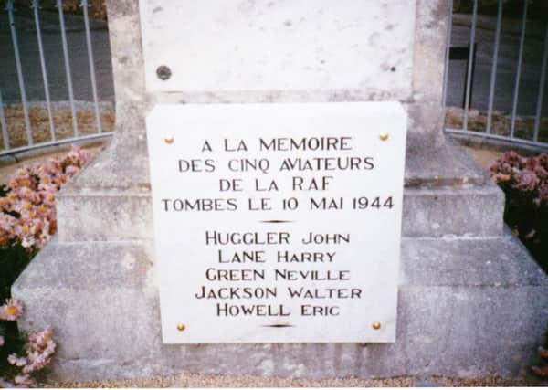 close-up of the plaque on the village War Memorial