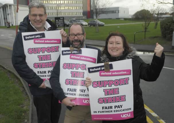Blackpool and The Fylde College staff protest outside in row over pay.  Pictured are Eddie Collett, Darren Bradshaw and Denice Kelly.